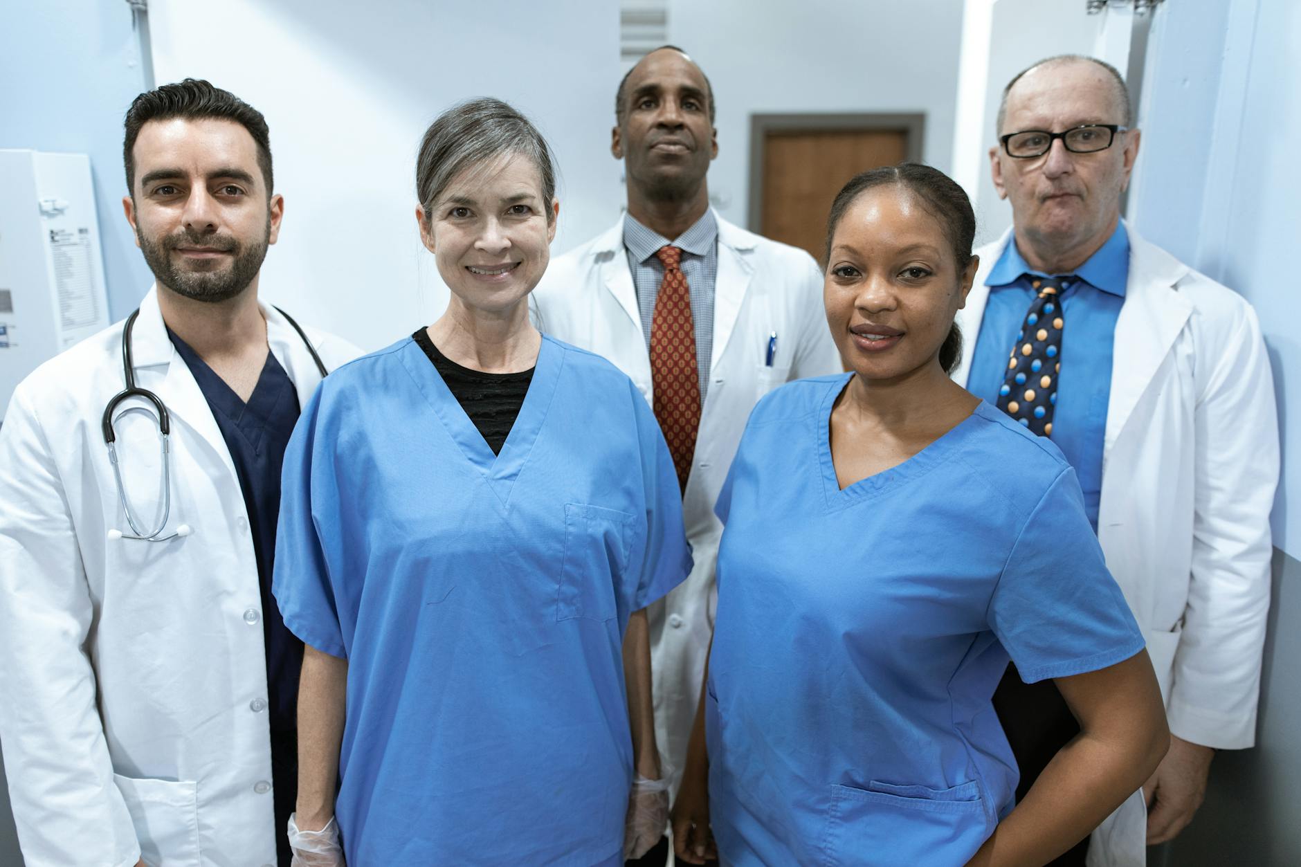 Physician and billing specialist reviewing medical billing contract checklist to choose the best billing service for an independent medical practice