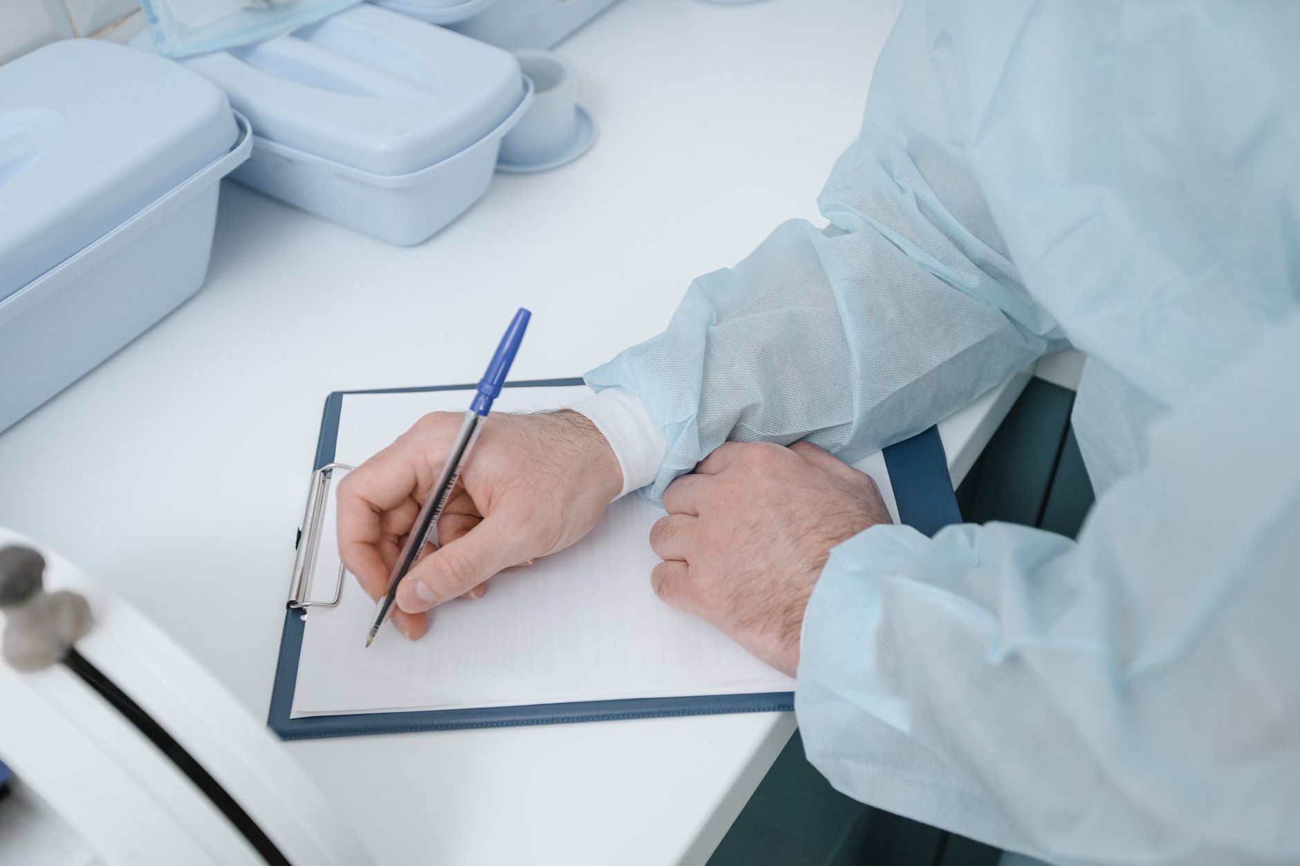 cardiac rehabilitation billing — Physician reviewing cardiac rehab billing documentation and CPT 93798 progress notes to prevent claim denia
