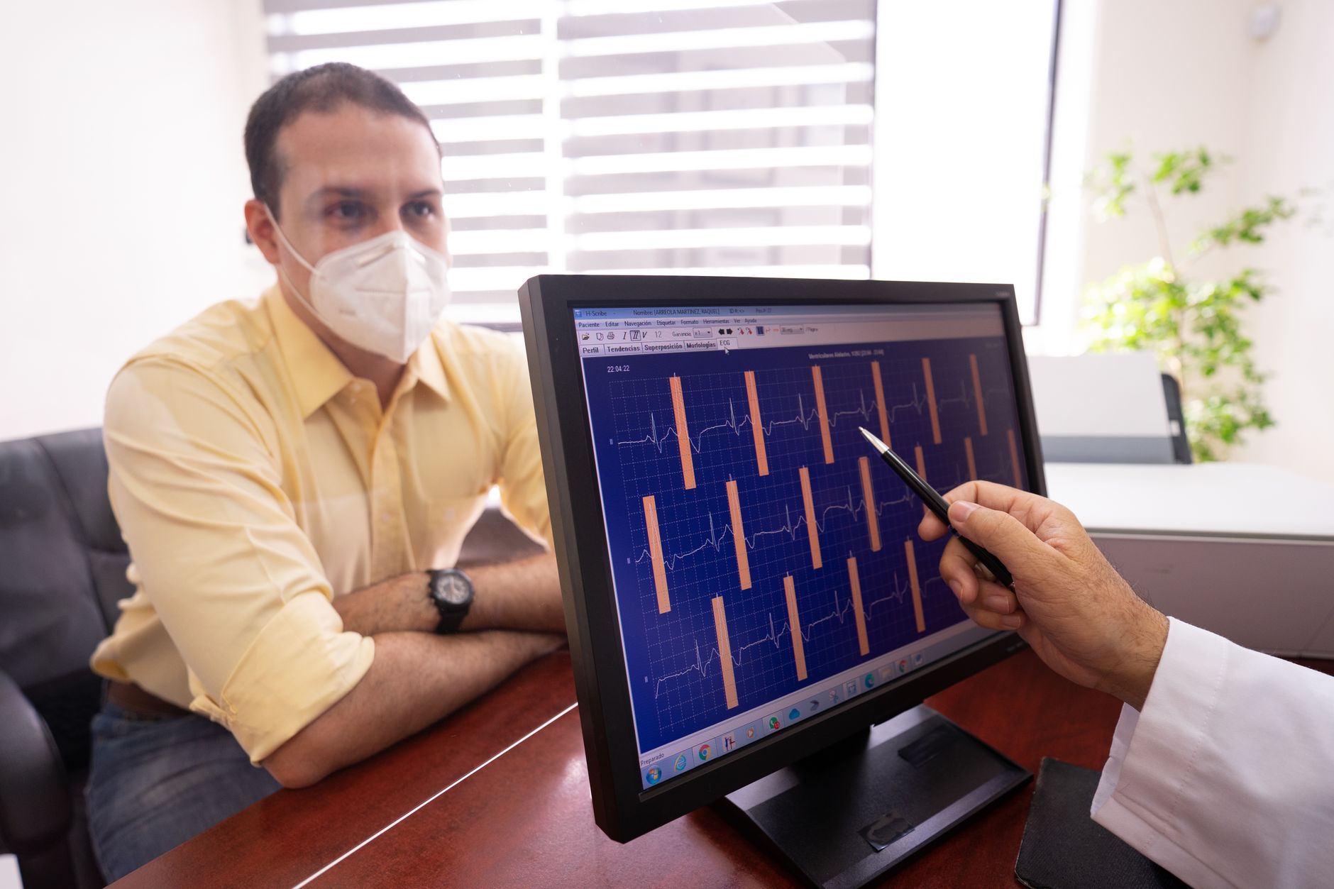 echocardiography billing and CPT codes — Cardiologist reviewing echocardiography billing documentation and CPT code modifier accuracy to red