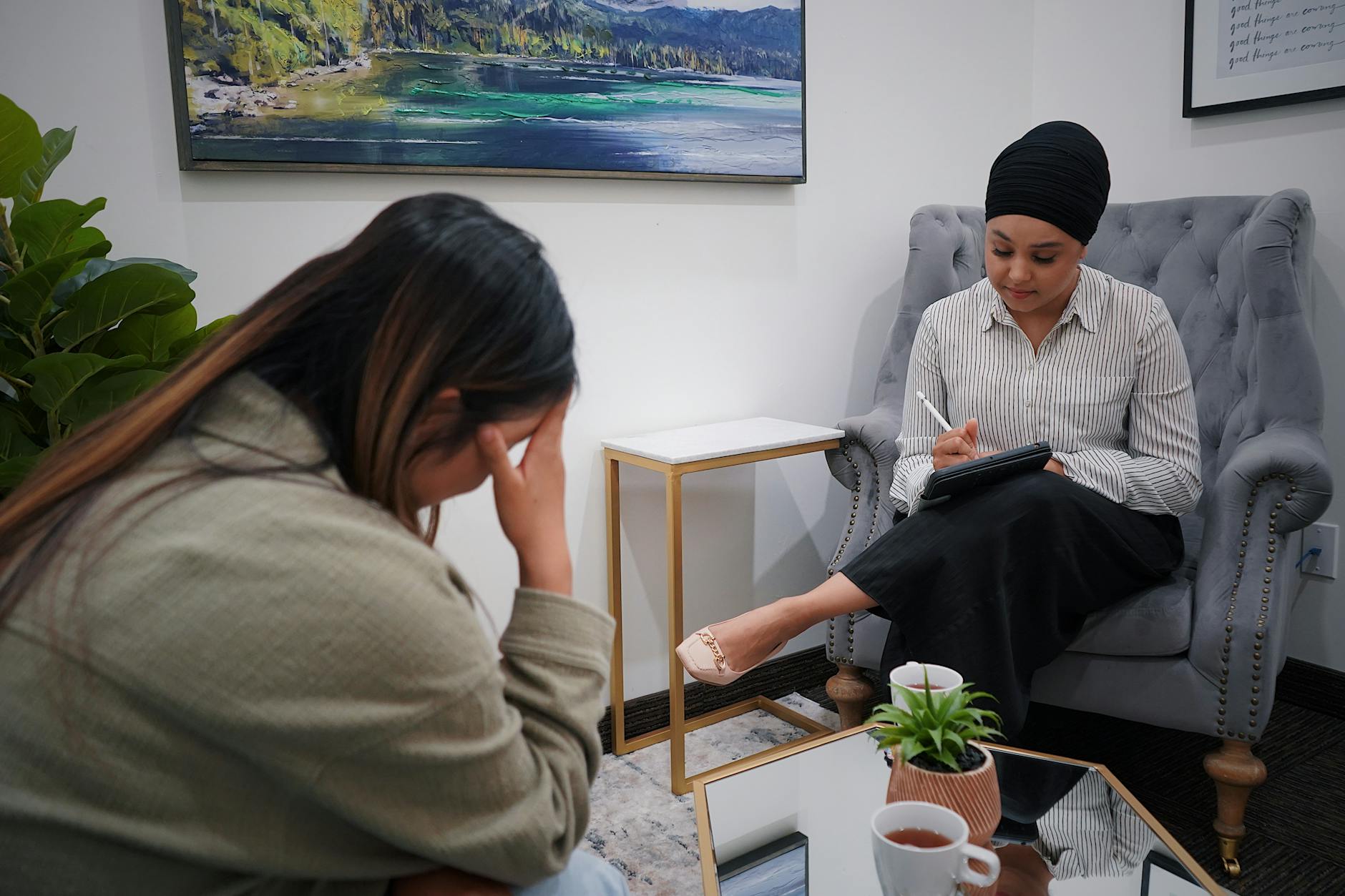 Therapist reviewing behavioral health billing claims on a laptop, illustrating outsource medical billing for mental health practices